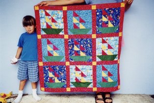 JJ and his quilt